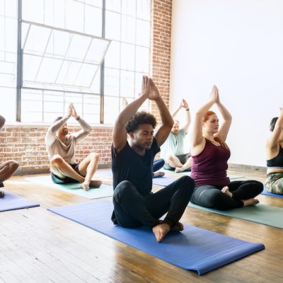 Diverse people in yoga pose